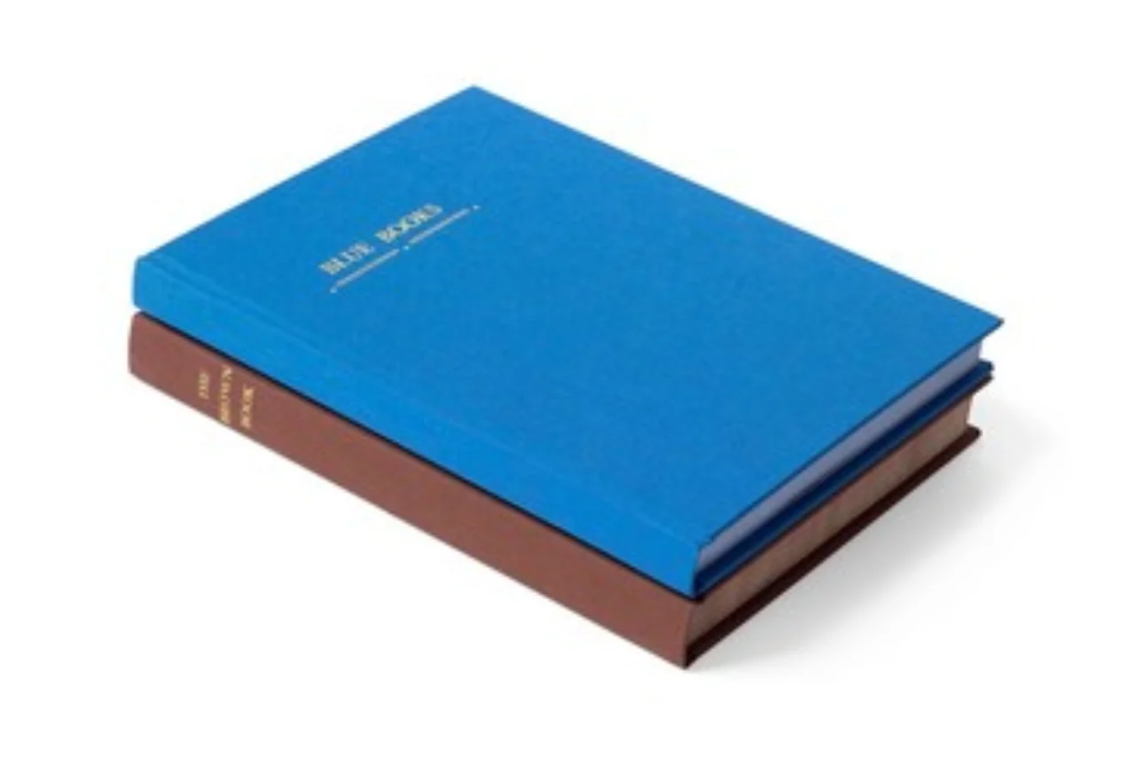 Jennifer Schmidt, ${esc.q}Blue and Brown Books,${esc.q} 2016, unique Risograph printed, hand bound, and foil stamped artist books,Courtesy of Jennifer Schmidt