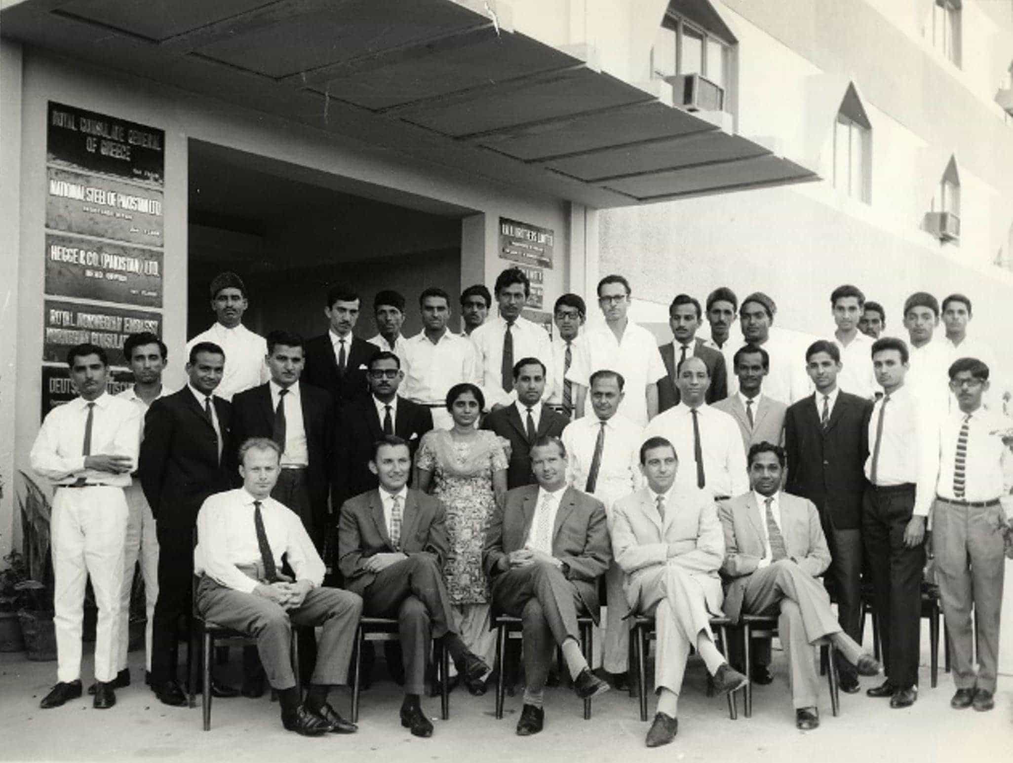 First building of DAB Karachi branch and staff members in 1962